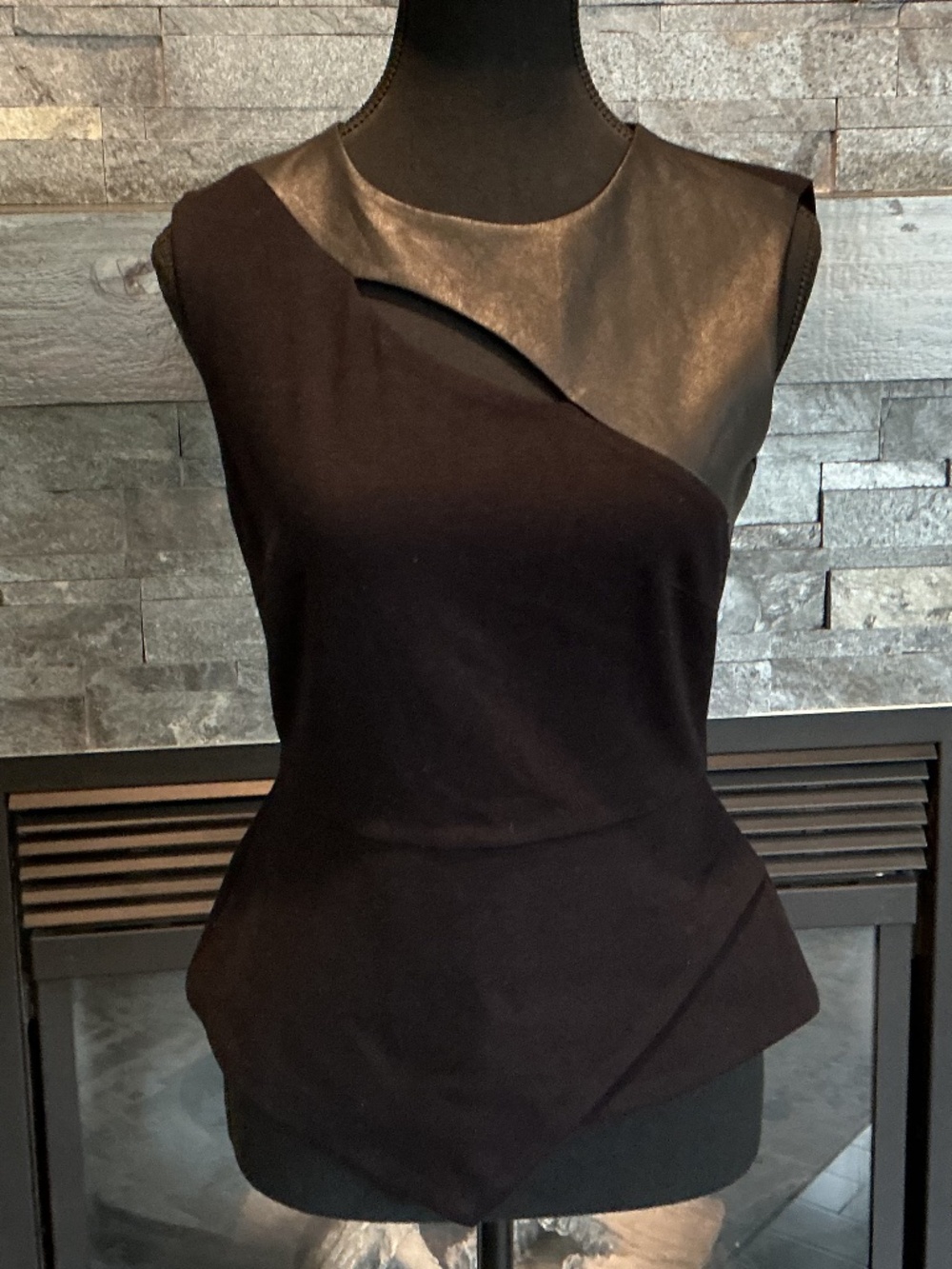 BCBG sleeveless peplum top with leather accents